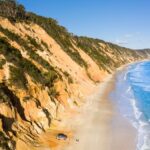 Beach rainbow australia cliffs